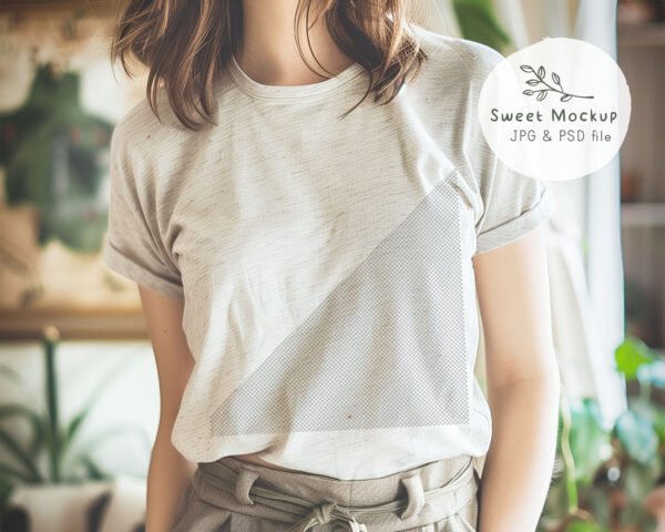T-shirt mockup of a person in a cozy living room with a flat, plain shirt – perfect for POD product display